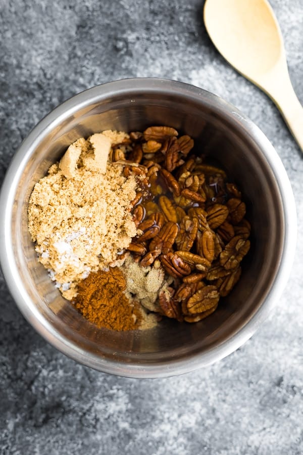 ingredients for the cinnamon pecans in a large bowl