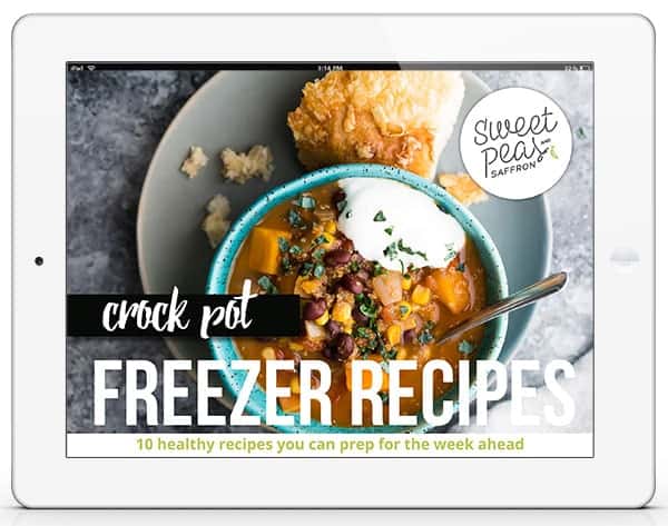 overhead shot of bowl of soup in blue bowl with a piece of bread and text overlay saying crock pot freezer recipes