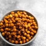 spicy roasted chickpeas in a gray bowl