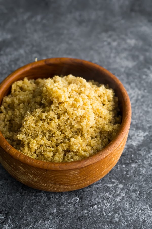 how long does cooked quinoa last- quinoa in wooden bowl