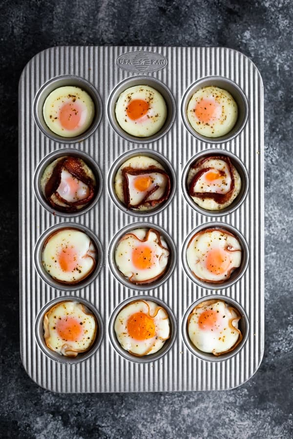 overhead view of baked eggs in a muffin tin