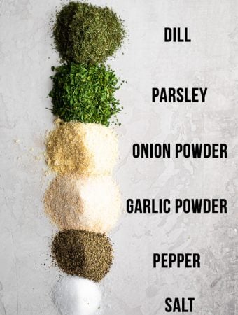 ingredients for homemade ranch seasoning on white background and labeled