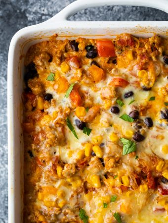 overhead shot of mexican spaghetti squash casserole in white baking dish