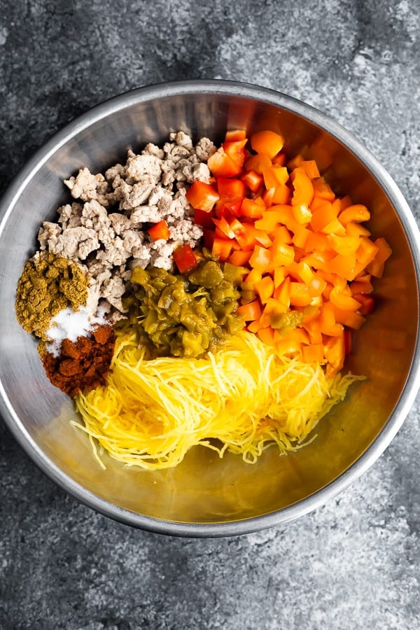 how to make spaghetti squash casserole: mixing ingredients in large bowl