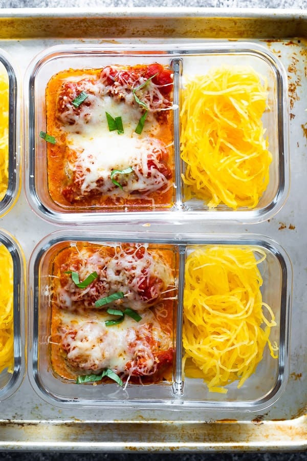 overhead view of Baked Meatball Meal Prep with Spaghetti Squash in glass meal prep containers