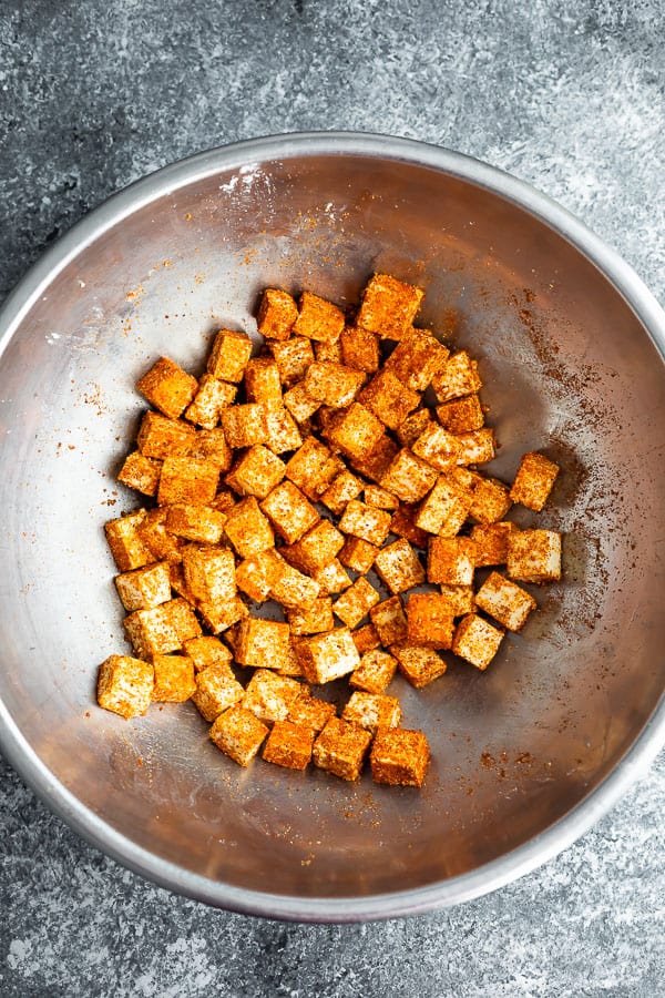 tofu cubes tossed in seasonings 