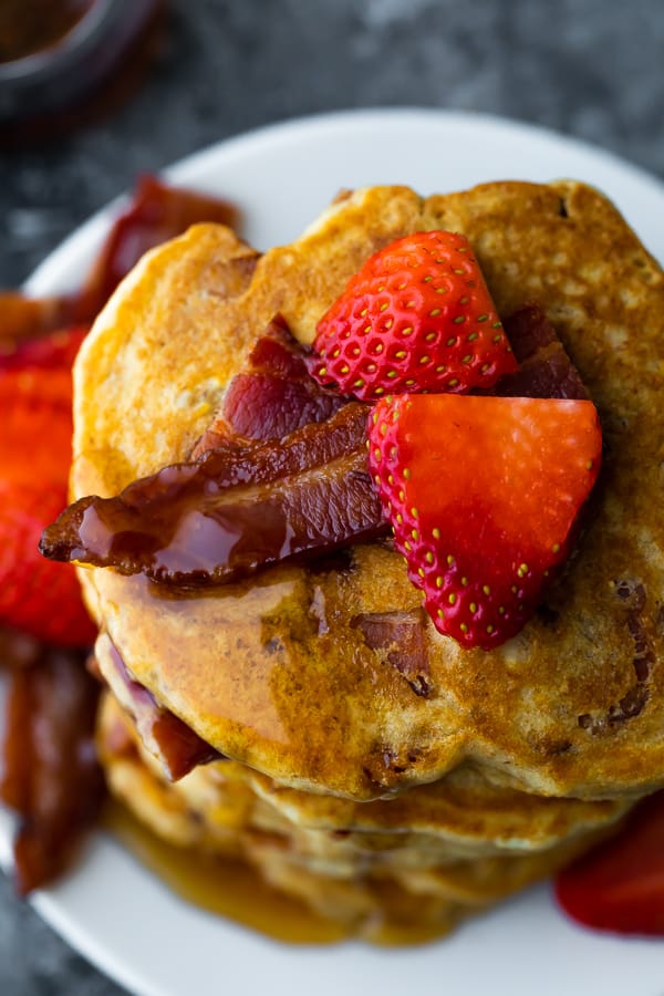 close up shot of a stack of the bacon pancakes recipe