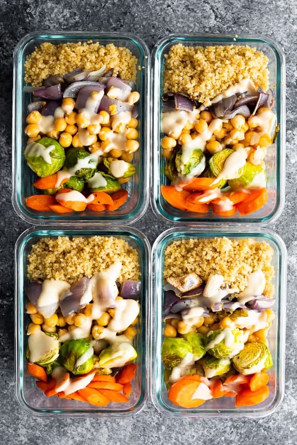 overhead view of 4 portions of vegan buddha bowl 