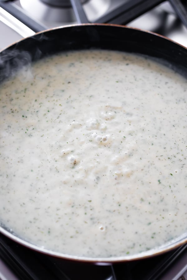 making the cream sauce for the keto cauliflower casserole