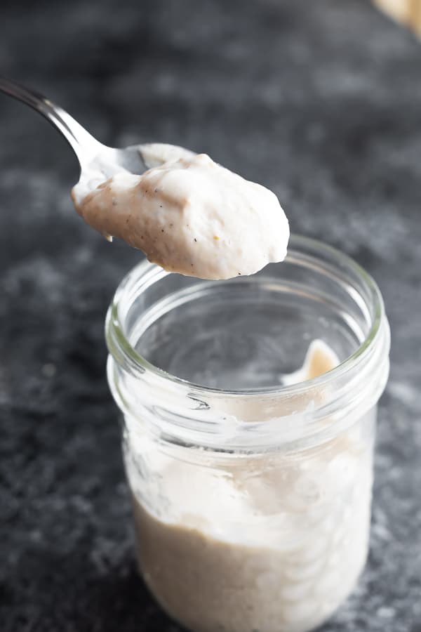 a spoon with caesar dressing recipe