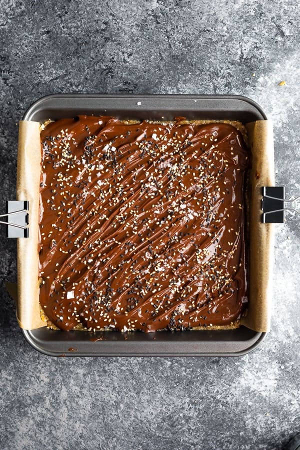 overhead view of Chocolate Tahini Oat Bars with chocolate