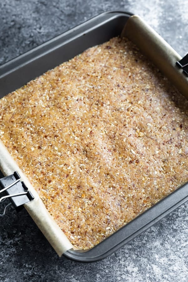 base for Chocolate Tahini Oat Bars in baking dish