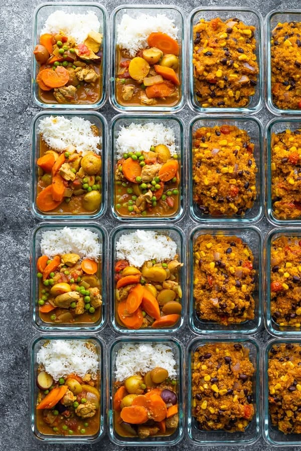 Overhead shot of rows of glass meal prep containers filled with freezer friendly lunch recipes