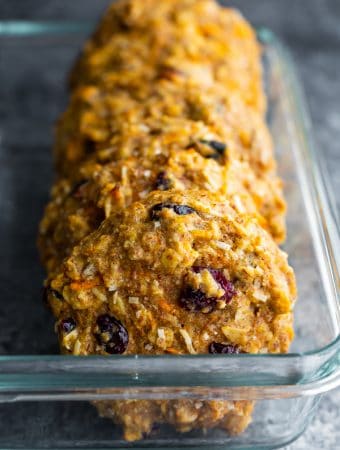 side view of a row of morning glory breakfast cookies in glass container