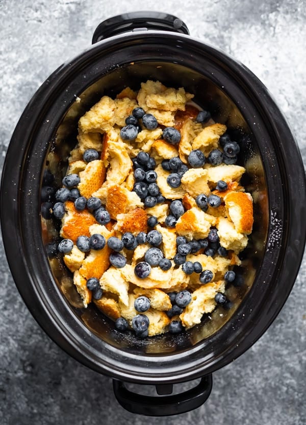 overhead view of french toast casserole crock pot in slow cooker