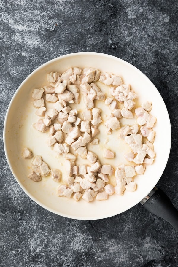 cooking the chicken for chicken lettuce wraps recipe in frying pan