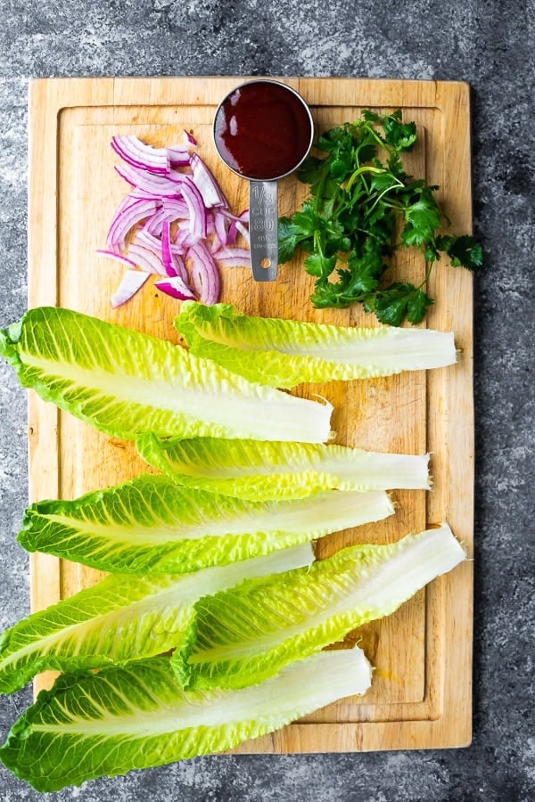 overhead view of ingredients for lettuce wraps recipe on cutting board