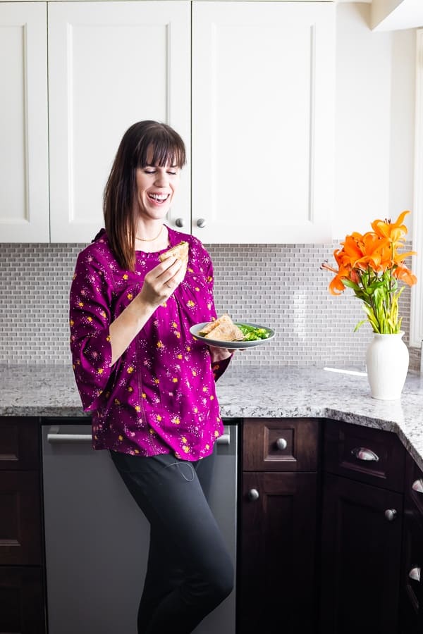 woman eating chicken quesadilla recipe