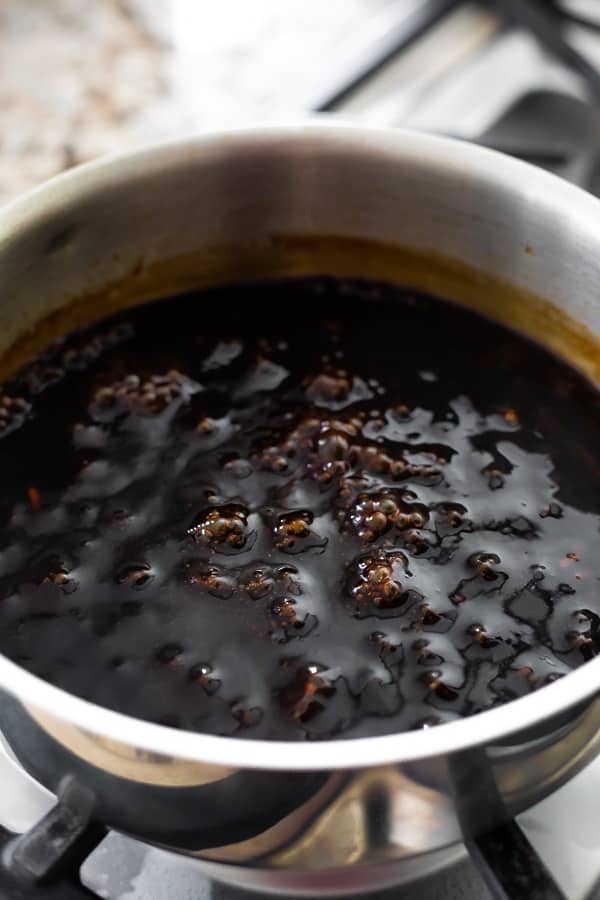 showing how to make teriyaki sauce- sauce simmering in pot