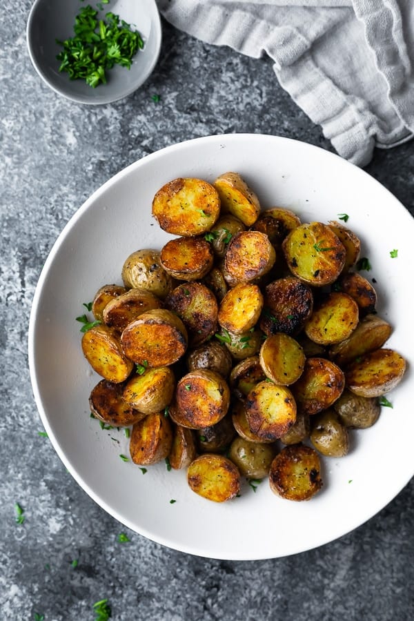 grilled potatoes in white bowl
