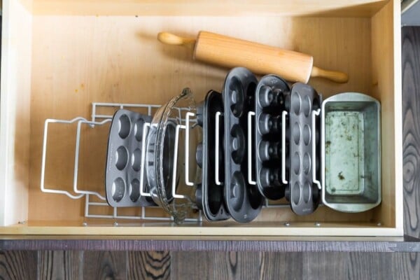 5 Kitchen Organization Tips- store baking equipment in pot lid holder