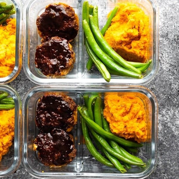 overhead shot of barbecue meatloaf meal prep bowls in glass meal prep containers