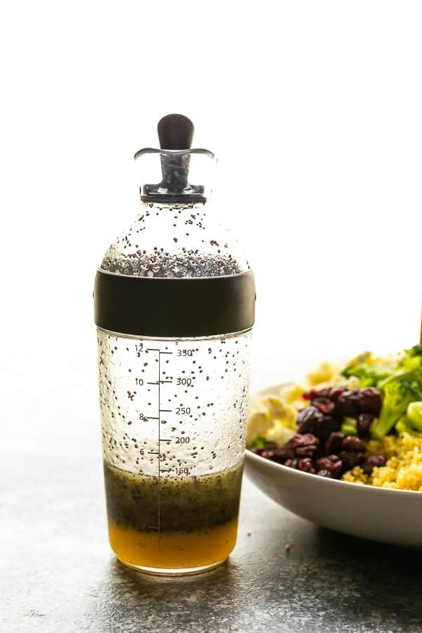 apple cider poppy seed broccoli salad dressing in shaker