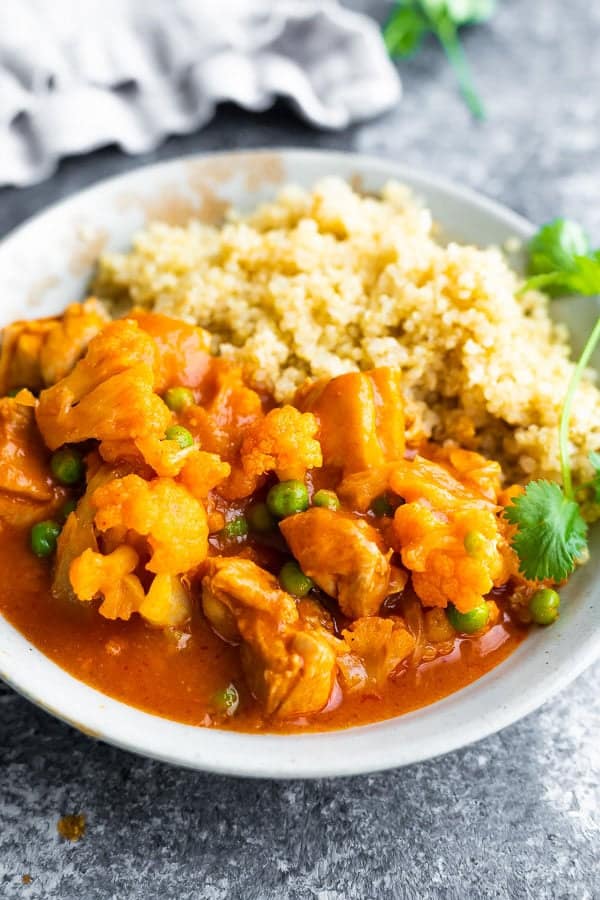 Chicken Tikka Masala with rice in a white bowl
