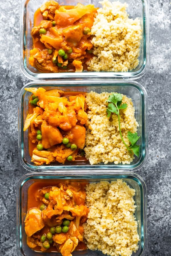 overhead view of instant pot chicken tikka masala in meal prep containers