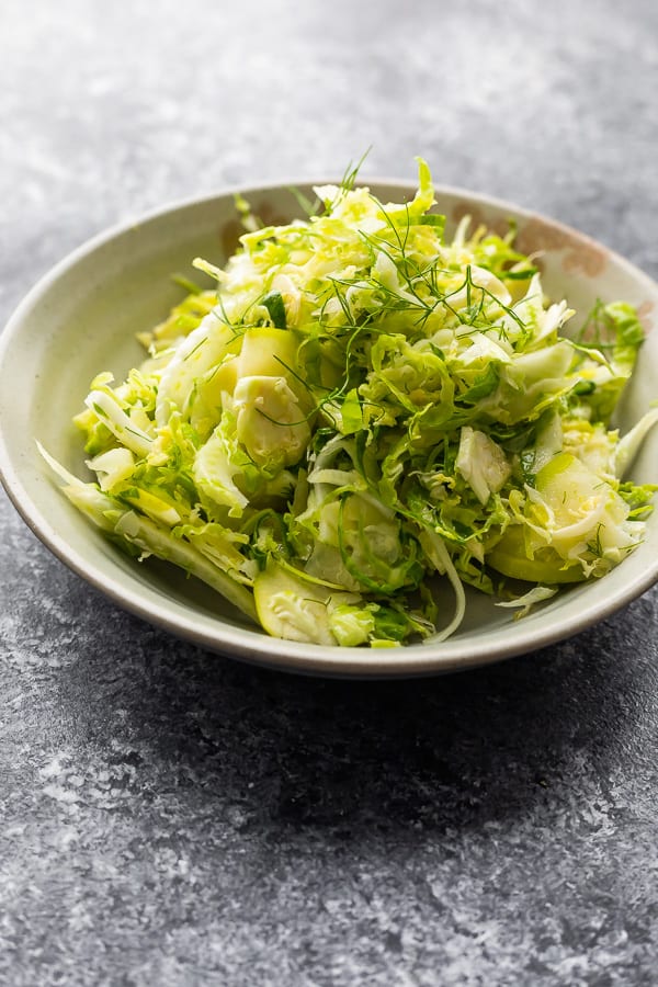 brussel sprout slaw in grey bowl