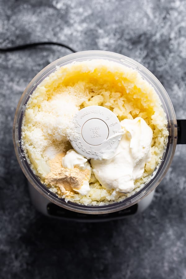 overhead view of cauliflower mashed potatoes in food processor