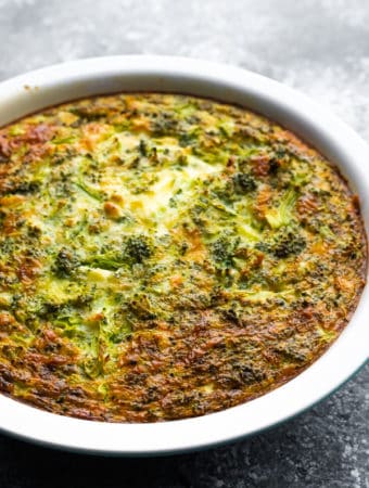 Broccoli cheese crustless quiche in a large white pie plate