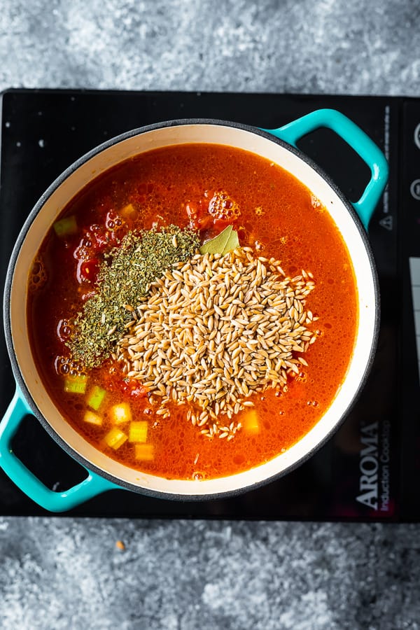 ingredients for farro soup in a pot