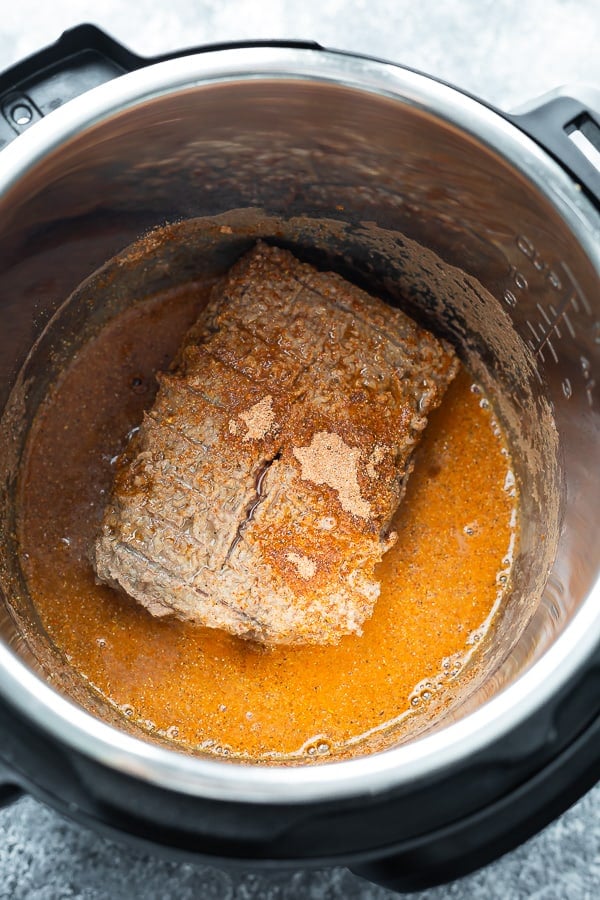 showing cooking frozen ground beef in the instant pot