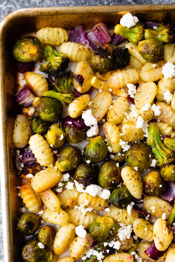 close up of the baked gnocchi on sheet pan