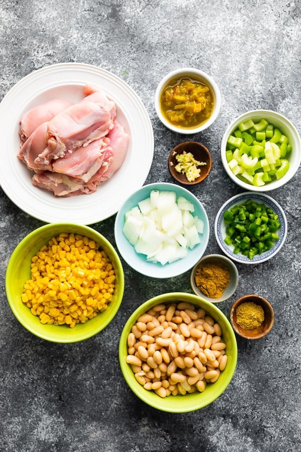 overhead view of ingredients required for slow cooker white chicken chili