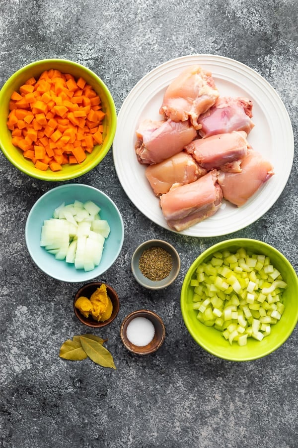 overhead view of ingredients in this crock pot chicken noodle soup