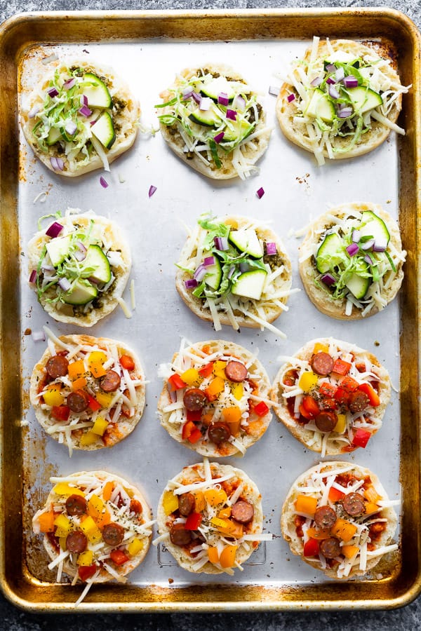 english muffin pizza recipe assembled on baking sheet (before baking)