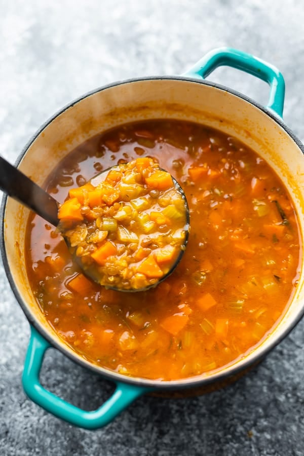 how to make lentil soup, ladle scooping soup after cooking