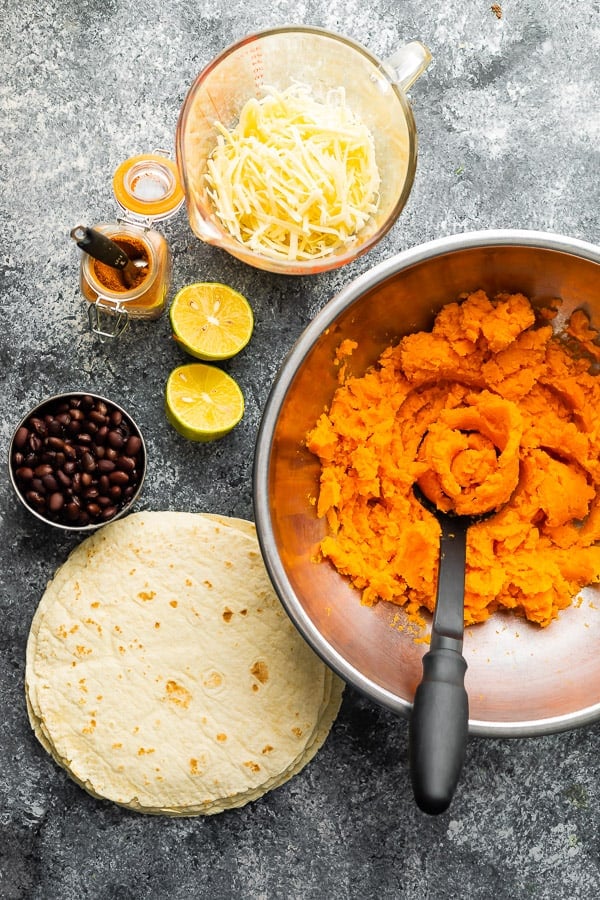 overhead view of ingredients needed for this black bean taquitos recipe