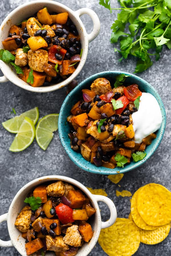 overhead shot of three bowls with Chili Lime Sweet Potato and Chicken Skillet