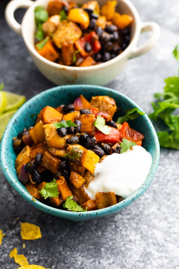 bowl of Chili Lime Sweet Potato and Chicken Skillet with yogurt