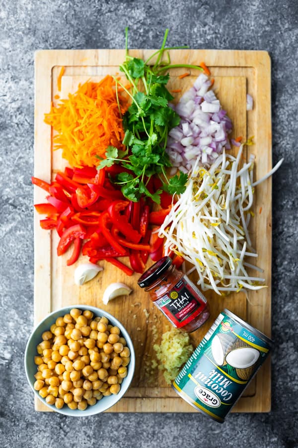 ingredients used in the curry soup on a cutting board