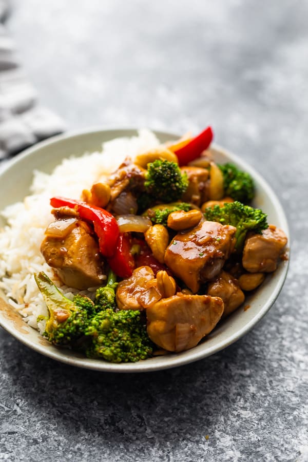 chicken with cashew nuts in bowl with rice