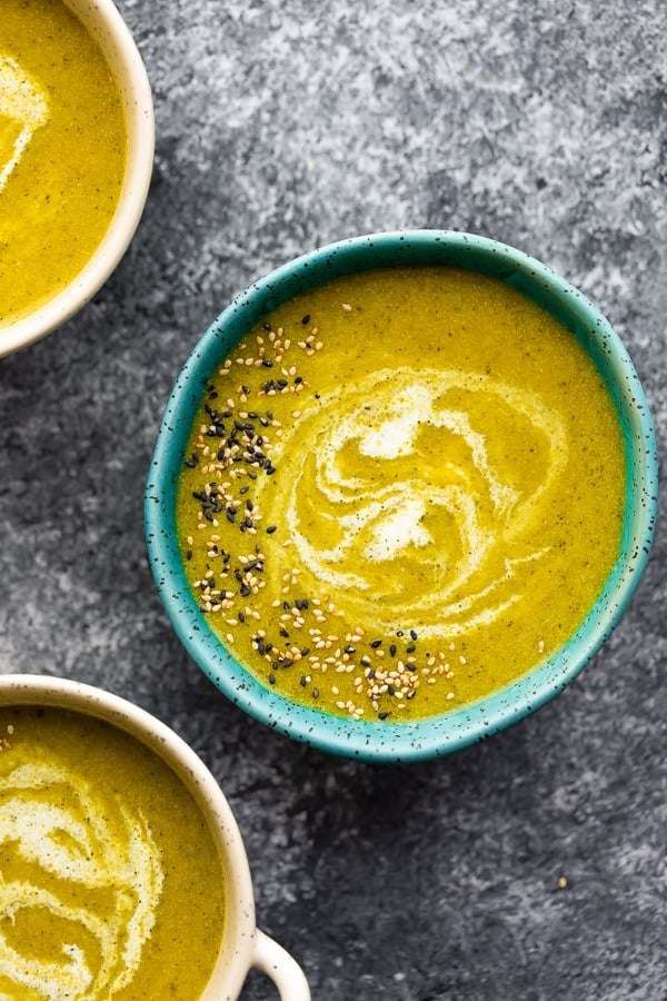 overhead view of broccoli turmeric soup in bowl