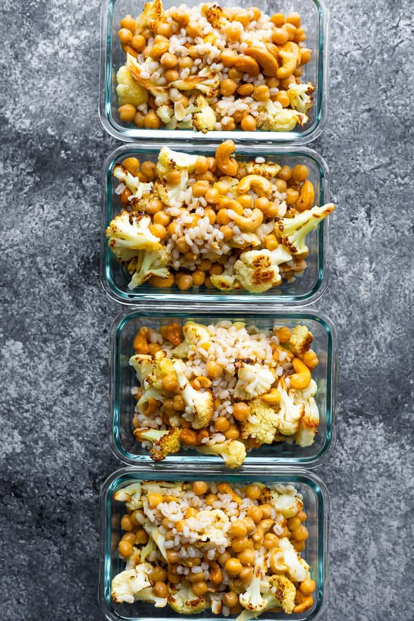 cauliflower cashew meal prep bowls portioned out in meal prep containers