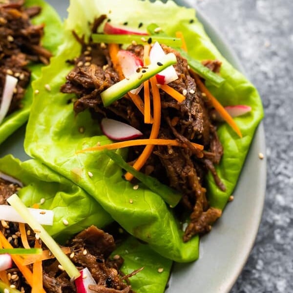 Korean beef lettuce wraps on a gray plate