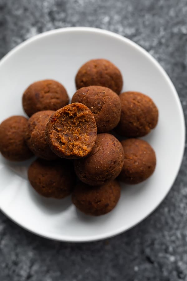 coconut date balls on a plate