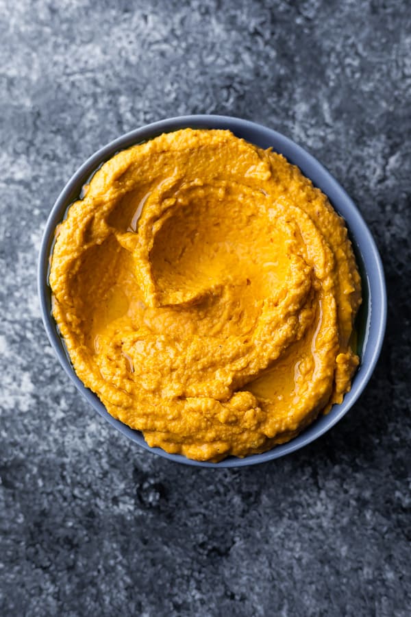 perfect sweet potato hummus in a bowl (overhead view)