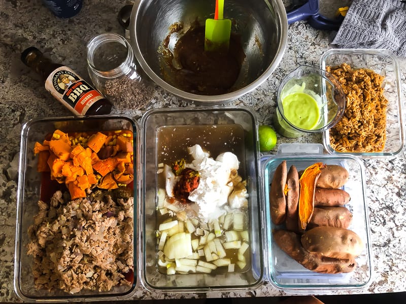 meal prep containers lined up on kitchen counter